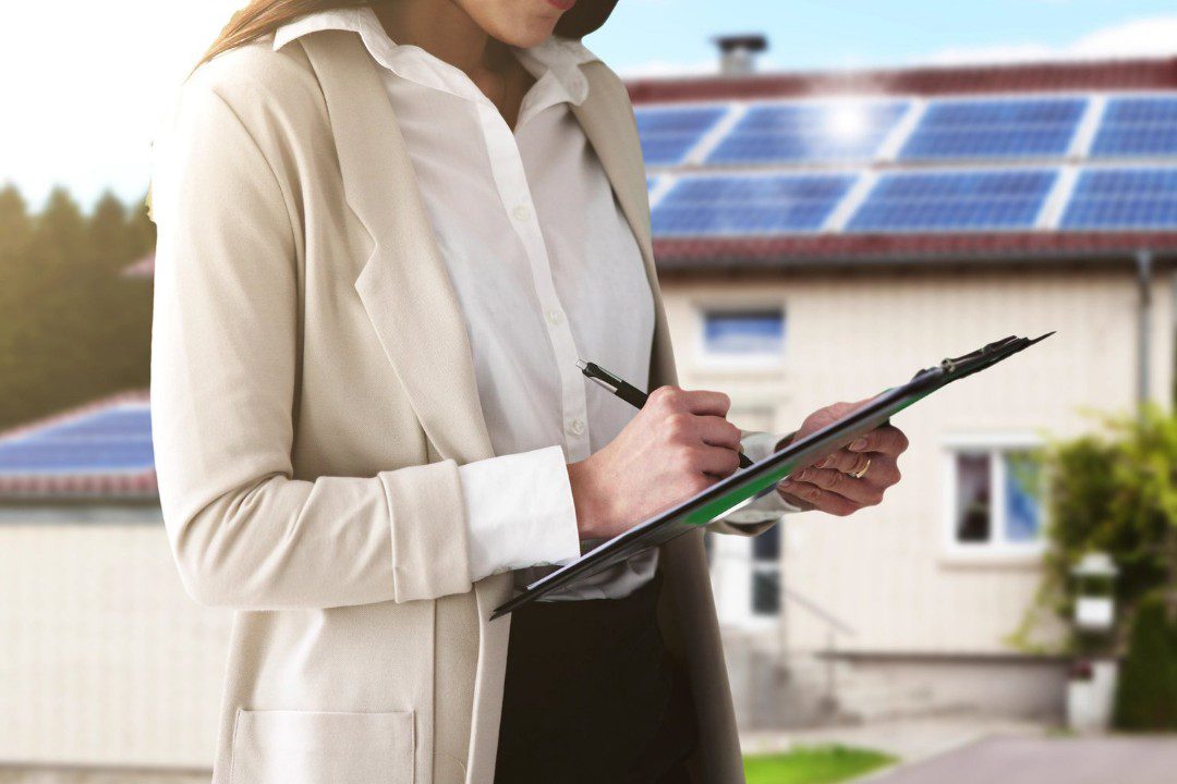 Home appraiser reviewing residential solar system