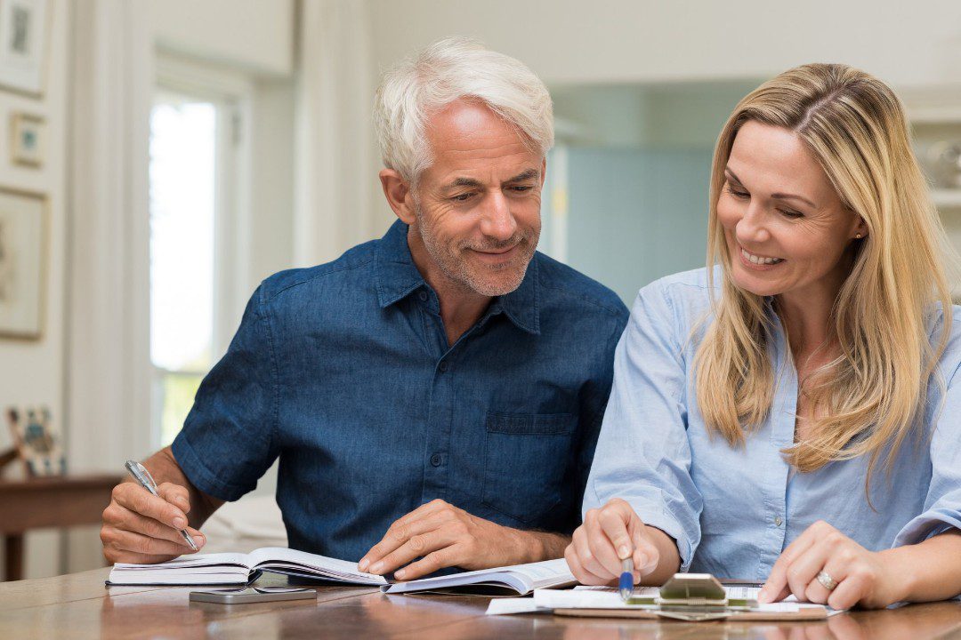 Couple reviewing solar system energy savings
